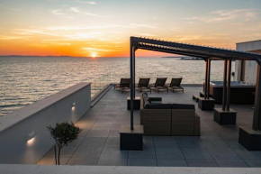 Aqua Blue by Belmont Realty